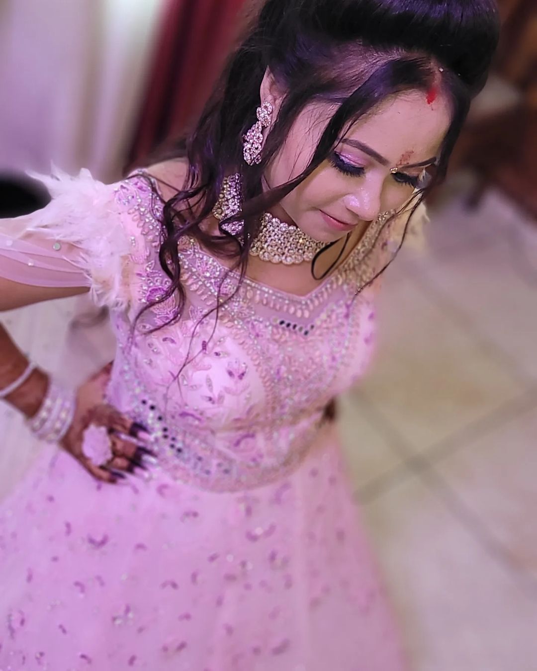 Minimalist bridal makeup with dewy skin and soft pink lips by Radhika Makeovers